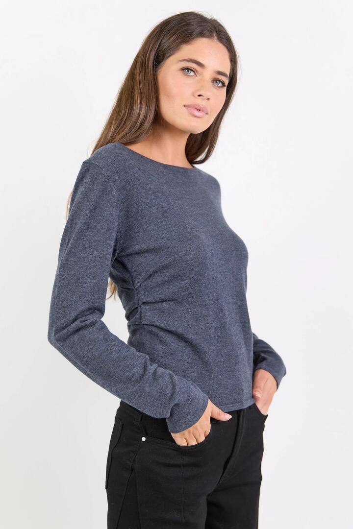 Image of a model wearing Outerwear. Product name - Groove Charcoal Ruched Side Long Sleeve Knit Top in Charcoal colour by brand - Among the Brave