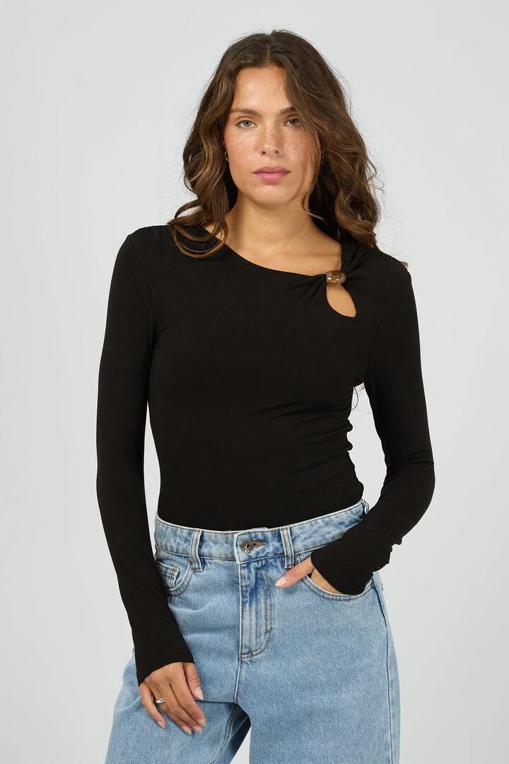 Image of a model wearing Tops. Product name - Atlas Black Bead LS Top in Black colour by brand - Silent Theory