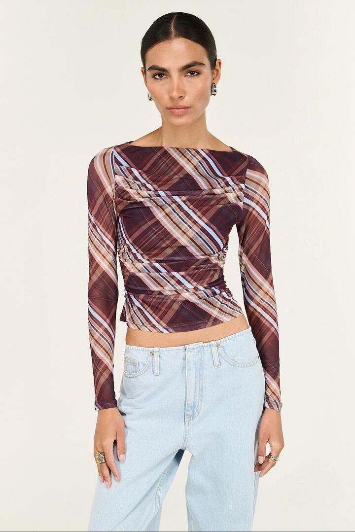 Image of a model wearing Tops. Product name - Arles Chocolate Check Mesh LS Top in Brown colour by brand - Staple The Label