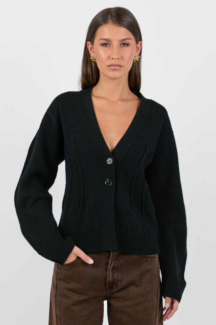 Image of a model wearing Outerwear. Product name - Bespoke Black V Neck Cinched Cardigan in Black colour by brand - Among the Brave