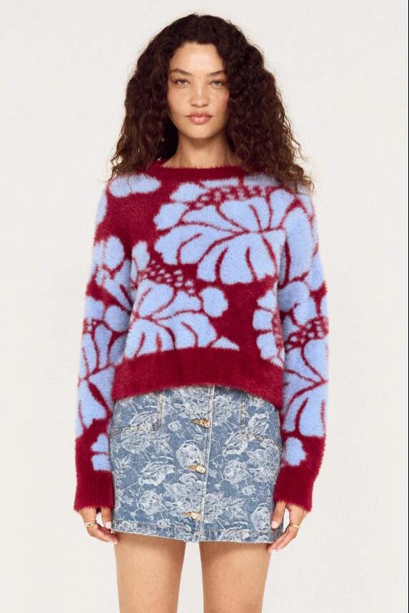 Image of a model wearing Outerwear. Product name - Amara Wine Blue Floral Intarsia Knit in Red colour by brand - Mink Pink