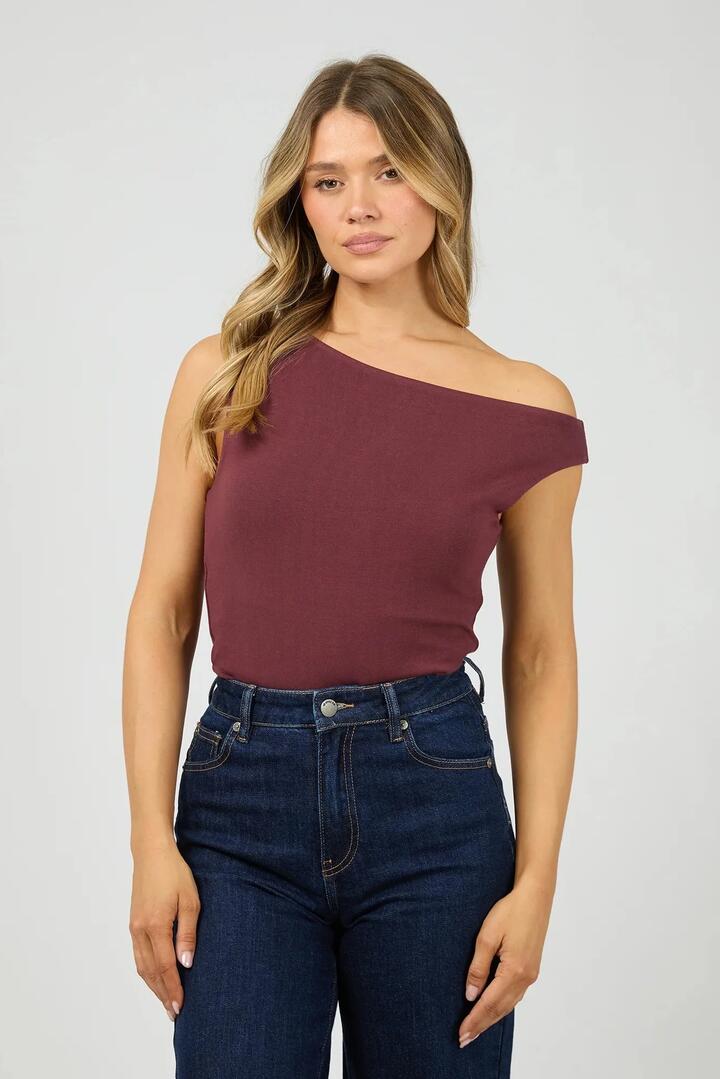 Image of a model wearing Tops. Product name - Kylie Burgundy Off Shoulder SS Top in Red colour by brand - All About Eve