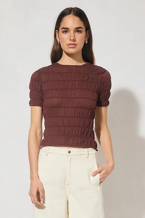 Image of a model wearing Tops. Product name - Vega Plum Shirred SS Tee in Red colour by brand - Mon Renn