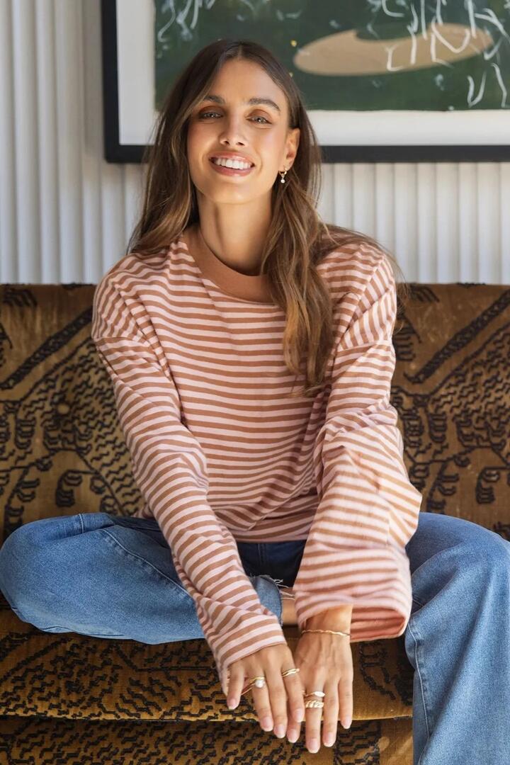 Image of a model wearing Tops. Product name - Paloma Cinnamon Pink Stripe LS Cotton Tee in Pink colour by brand - All About Eve