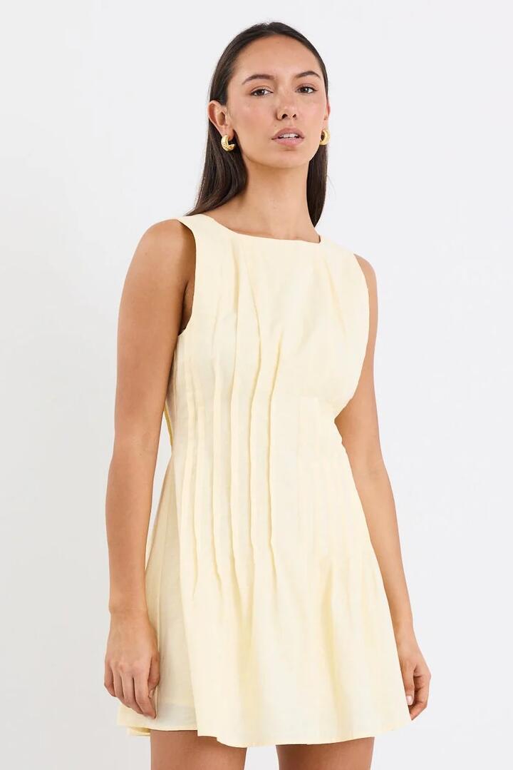 Image of Dresses. Product name - Backstage Yellow Pintuck Bodice Mini Dress in Yellow colour by brand - Stories be Told