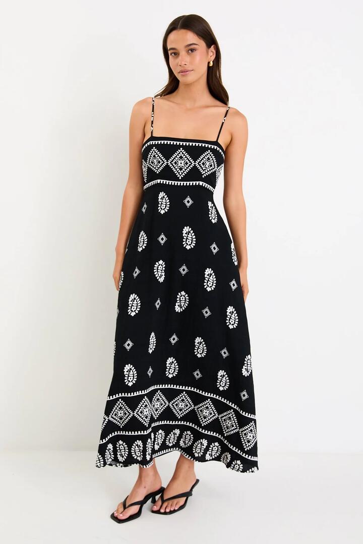 Image of Dresses. Product name - Sundeck Black Border Print Strappy Maxi Dress in Black Border Print colour by brand - Stories be Told