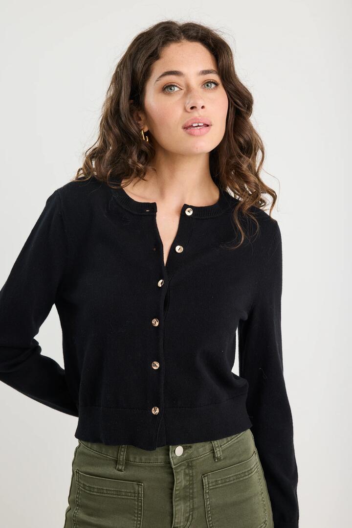Image of a model wearing Outerwear. Product name - Replica Black Cotton Cashmere Crewneck Cardigan in Black colour by brand - Among the Brave