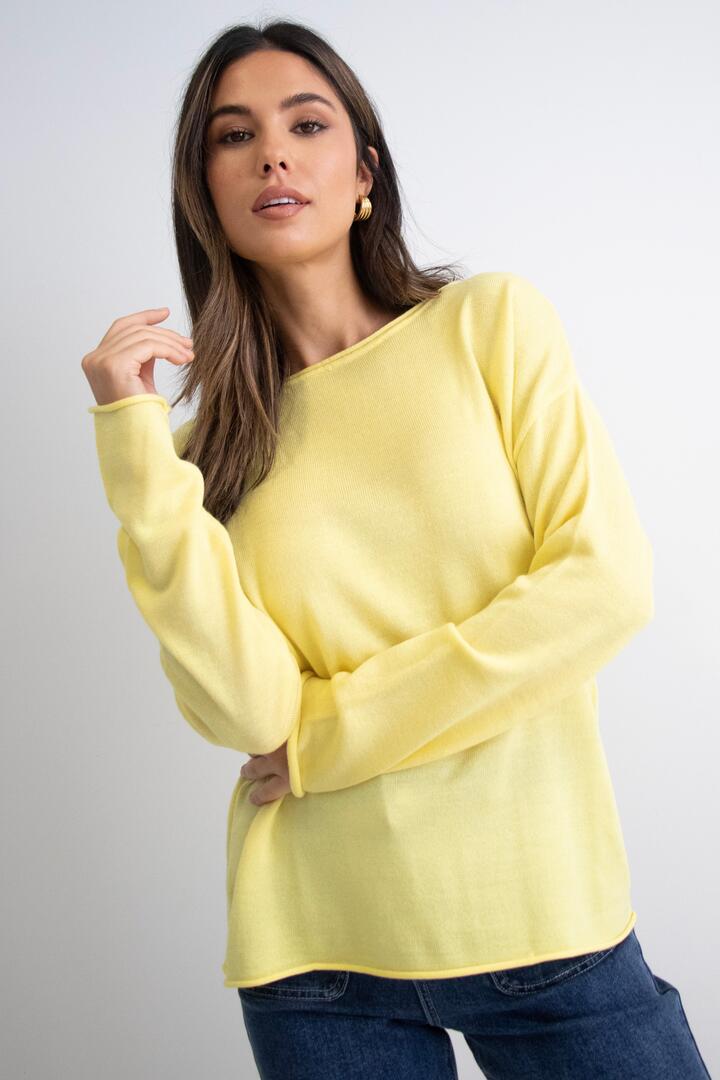Image of a model wearing Outerwear. Product name - Legacy Lemon Knit Wide Neck Jumper in Lemon colour by brand - Among the Brave