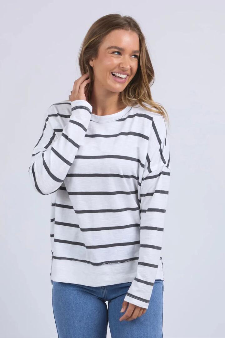 Image of a model wearing Tops. Product name - Layne Charcoal Stripe Throw LS Top in Charcoal colour by brand - Foxwood