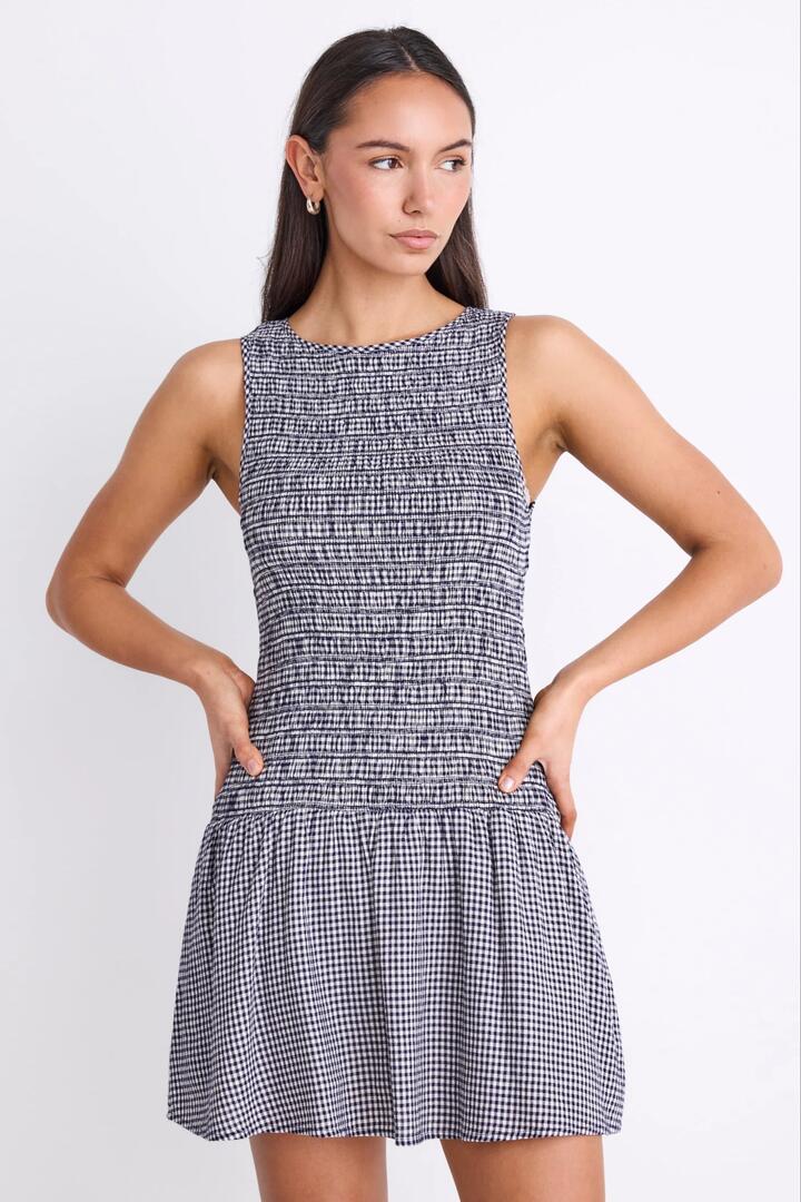 Image of Dresses. Product name - Laurel Navy Mini Gingham Sleeveless Shirred Bodice Mini Dress in Navy Mini Gingham colour by brand - RE:UNION Label