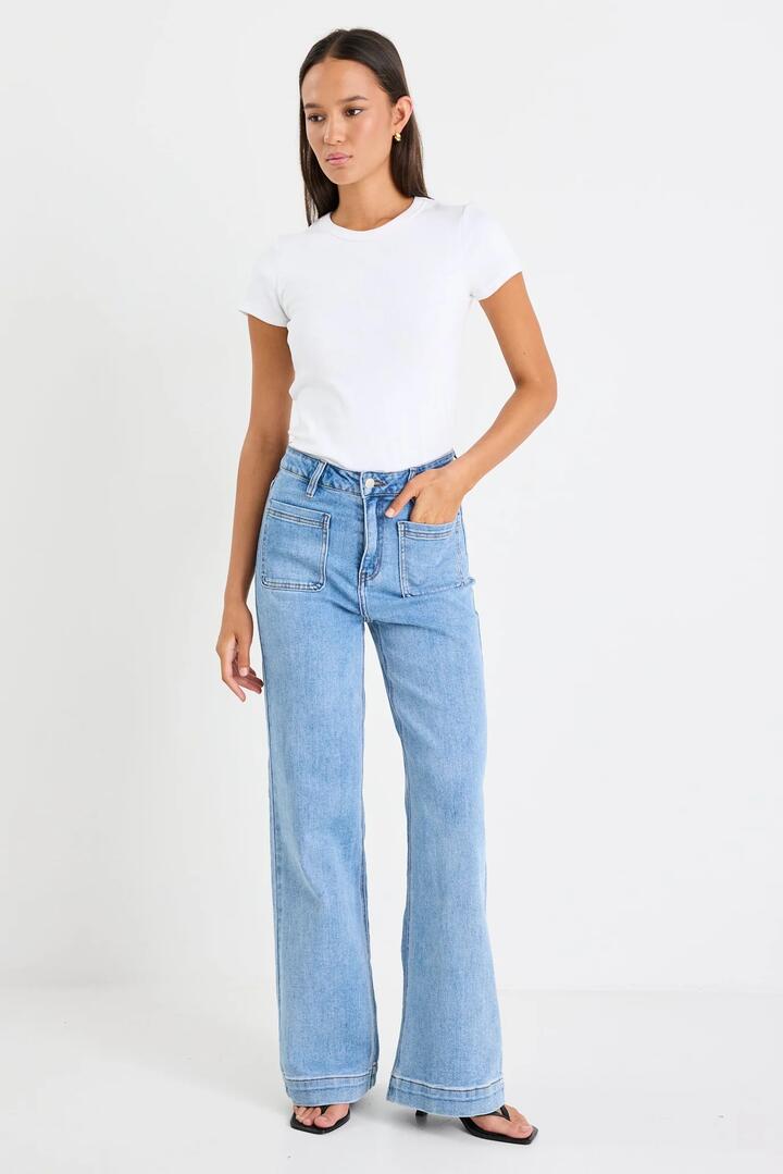 Image of Jeans. Product name - Zoey Signature Blue High Rise Wide Leg Pocket Jean in Signature Blue colour by brand - Among the Brave