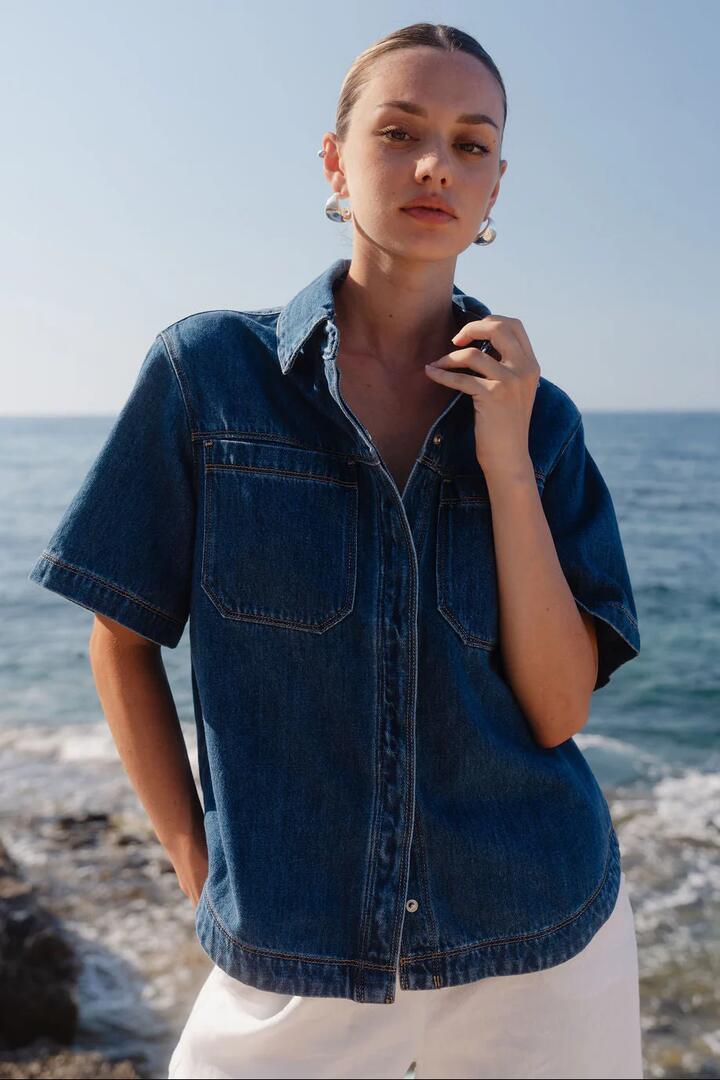 Image of Shirts. Product name - Crucial Storm Blue Denim Short Sleeve Shacket in Storm Blue colour by brand - Stories be Told