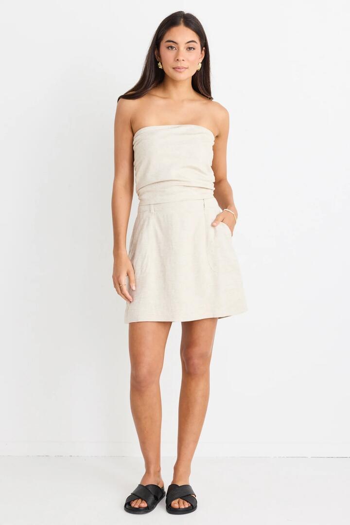Image of a model wearing Tops. Product name - Conceptual Natural Linen Blend Strapless Top in Natural colour by brand - Love Lulu