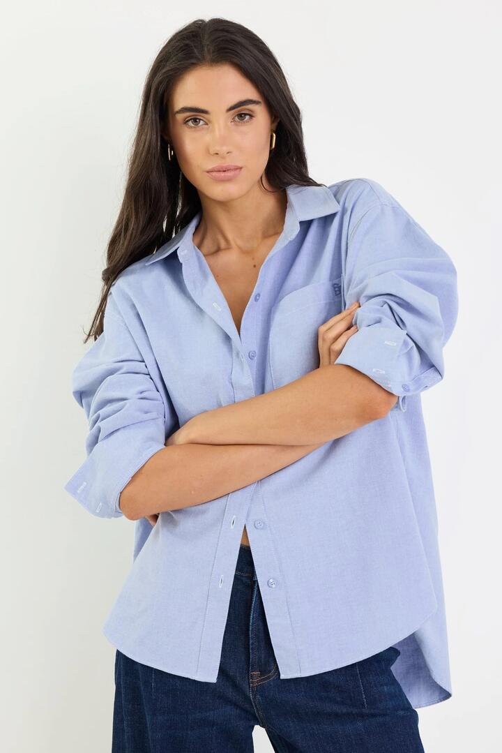 Image of Shirts. Product name - Signature Blue Oxford Oversized Shirt in Blue Oxford colour by brand - Stories be Told