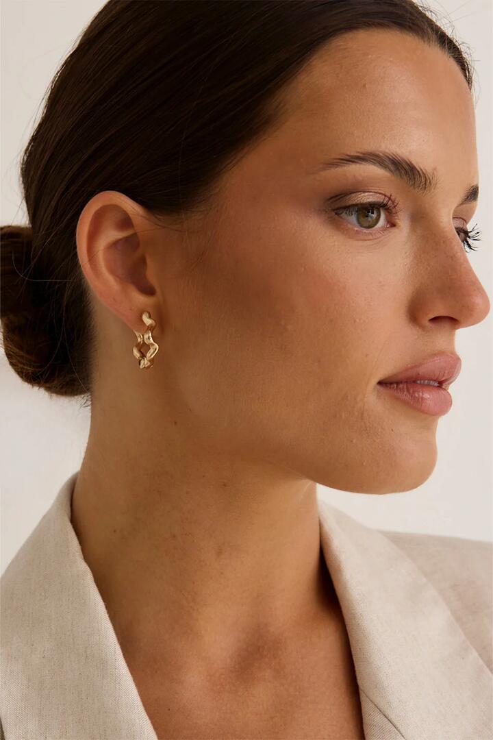Image of Jewelry. Product name - Large Wavey Hoop Gold Earring in Gold colour by brand - Humble + Heart