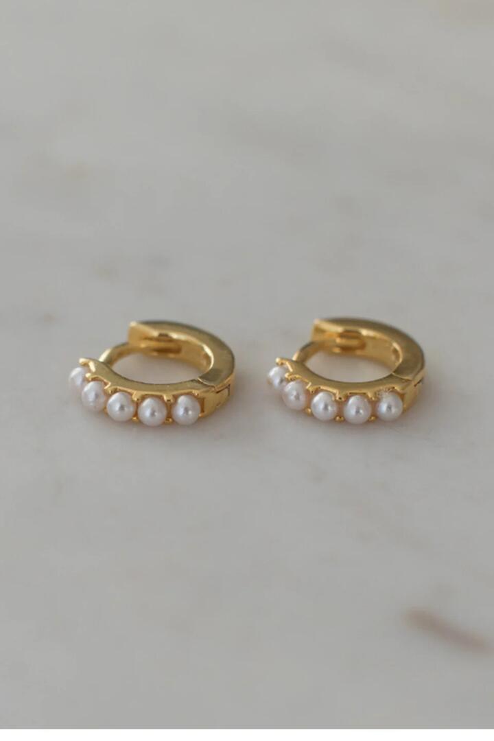 Image of Jewelry. Product name - Mini Pearl Huggies Earrings Gold in Gold colour by brand - Sophie