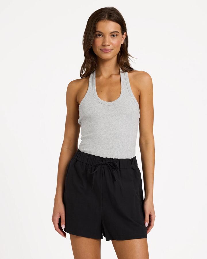 Image of a model wearing Shorts. Product name - Roxy Womens Place To Be Linen Shorts Black in Black colour by brand - Roxy