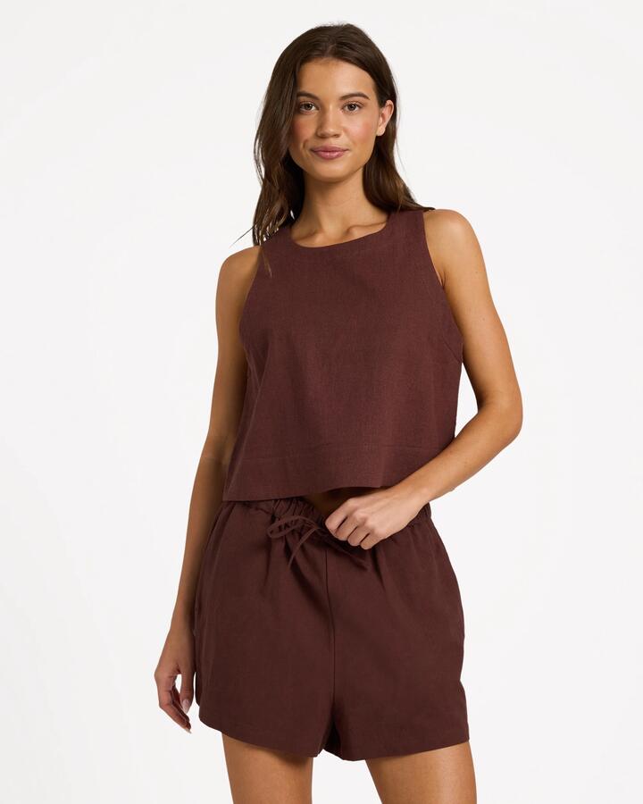 Image of a model wearing Shorts. Product name - Roxy Womens Place To Be Linen Shorts Java in Java colour by brand - Roxy