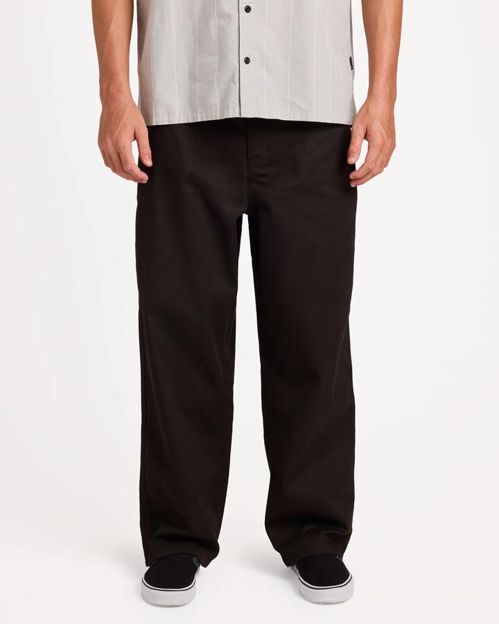 Image of a model wearing Pants. Product name - Volcom Mens Billow Chino Pants Black in Black colour by brand - Volcom