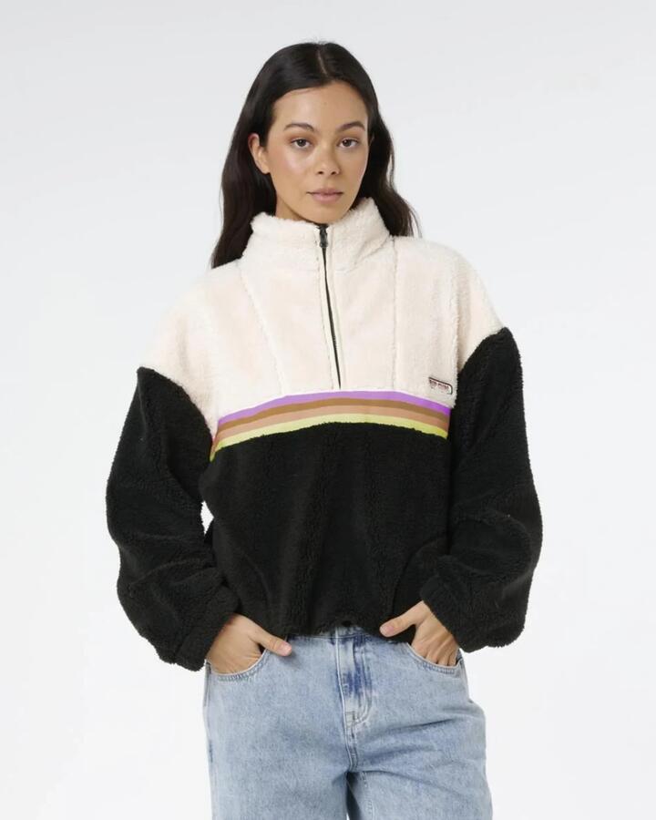 Image of a model wearing Outerwear. Product name - Rip Curl Womens Surf Revival Polar Fleece Jumper Washed Black Rainbow in Washed Black Rainbow colour by brand - Rip Curl