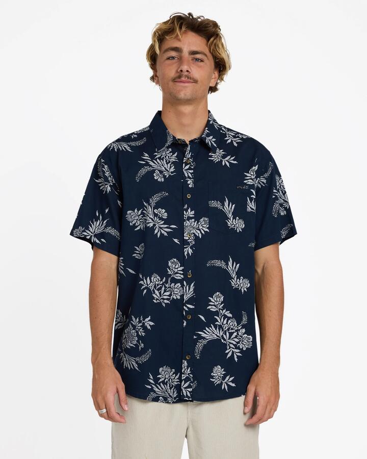 Image of a model wearing Tops. Product name - Billabong Mens Sundays Short Sleeve Shirt True Navy in True Navy colour by brand - Billabong