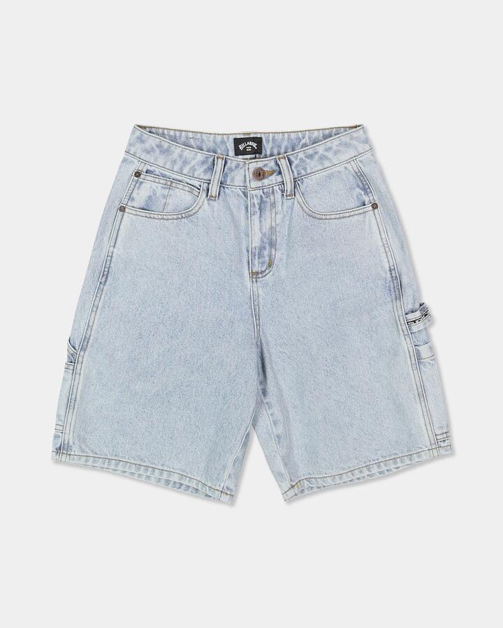 Image of a model wearing Shorts. Product name - Billabong Boys 8-16 Bad Dog 21" Walkshorts Washed Indigo in Washed Indigo colour by brand - Billabong