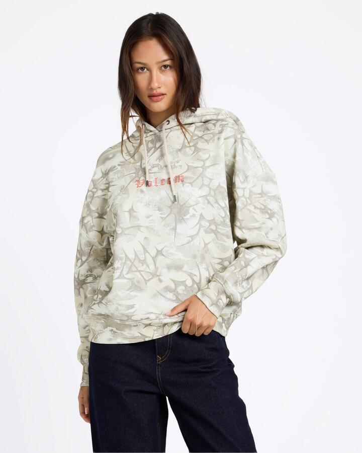 Image of a model wearing Outerwear. Product name - Volcom Womens Shadowed Pullover Hoodie Camouflage in Camouflage colour by brand - Volcom