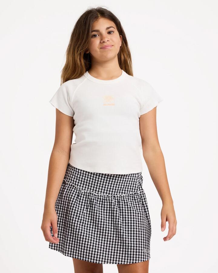 Image of a model wearing Skirts. Product name - Billabong Girls 6-16 Gingham Crush Mini Skirt Black White in Black White colour by brand - Billabong