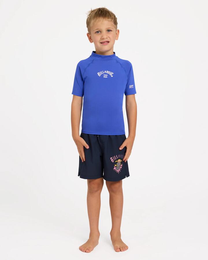 Image of a model wearing Tops. Product name - Billabong Boys 2-7 Groms All Day Arch Rf Short Sleeve Rash Vest Cobalt in Cobalt colour by brand - Billabong