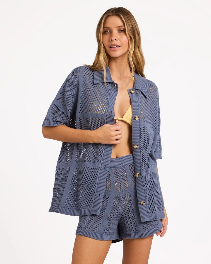 Image of a model wearing Tops. Product name - Billabong Womens Cool Down Short Sleeve Shirt Blue Smoke in Blue Smoke colour by brand - Billabong