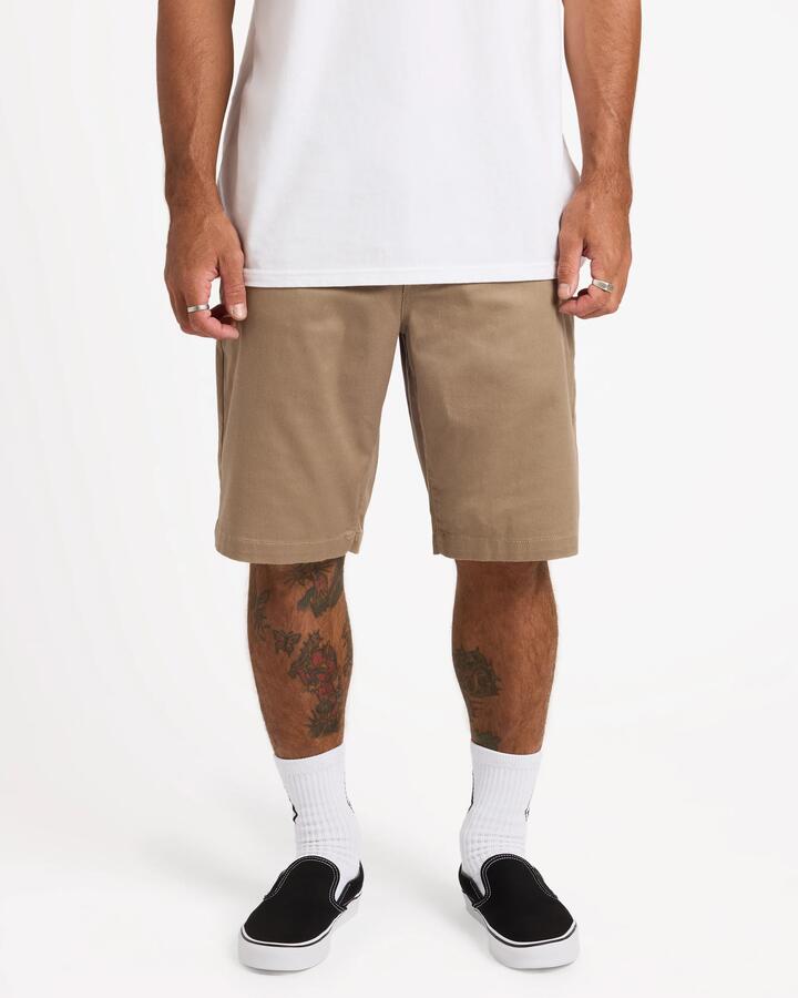 Image of a model wearing Shorts. Product name - Volcom Mens Frickin Modern Shorts Khaki in Khaki colour by brand - Volcom