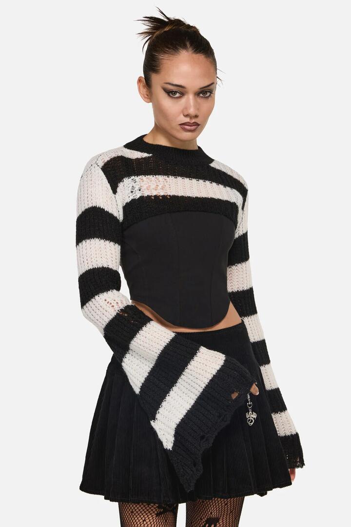 Image of a model wearing Tops. Productname: Beasts Knit Sleeves in Black/White colour by brand - Black Friday