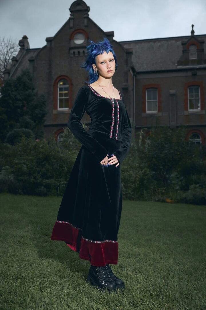 Image of a model wearing Skirts. Productname: Squire Goth Velour Midi Skirt in Black colour by brand - Black Friday