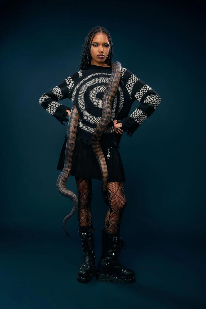 Image of a model wearing Tops. Productname: Slithering Goth Knit in Black/White colour by brand - Dangerfield