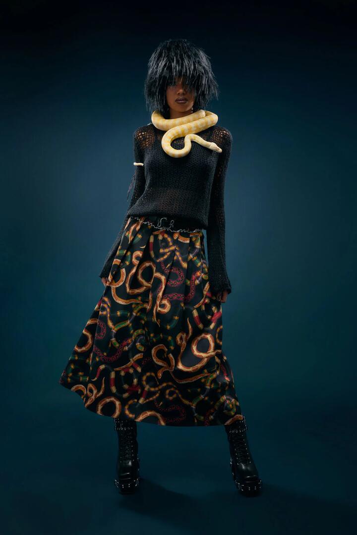 Image of a model wearing Skirts. Productname: Reptilian Print Midi Skirt in Multi colour by brand - Dangerfield
