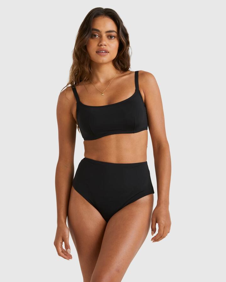 Image of a model wearing Tops. Product name - Billabong Womens Sol Searcher Mia D/Dd Bralette Bikini Top Old Style Dont Turn Online Black in Black colour by brand - Billabong