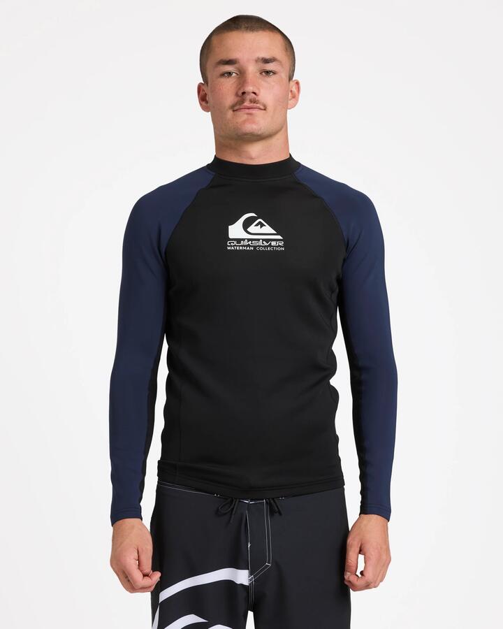 Image of a model wearing Outerwear. Product name - Quiksilver Watermans Ls Panel Heater Black/Navy Blazer in Black/Navy Blazer colour by brand - Quiksilver