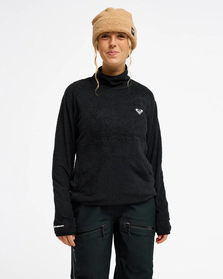 Image of a model wearing Outerwear. Product name - Roxy Womens Heat Haven Primaloft Layer Technical Fleece True Black in True Black colour by brand - Roxy