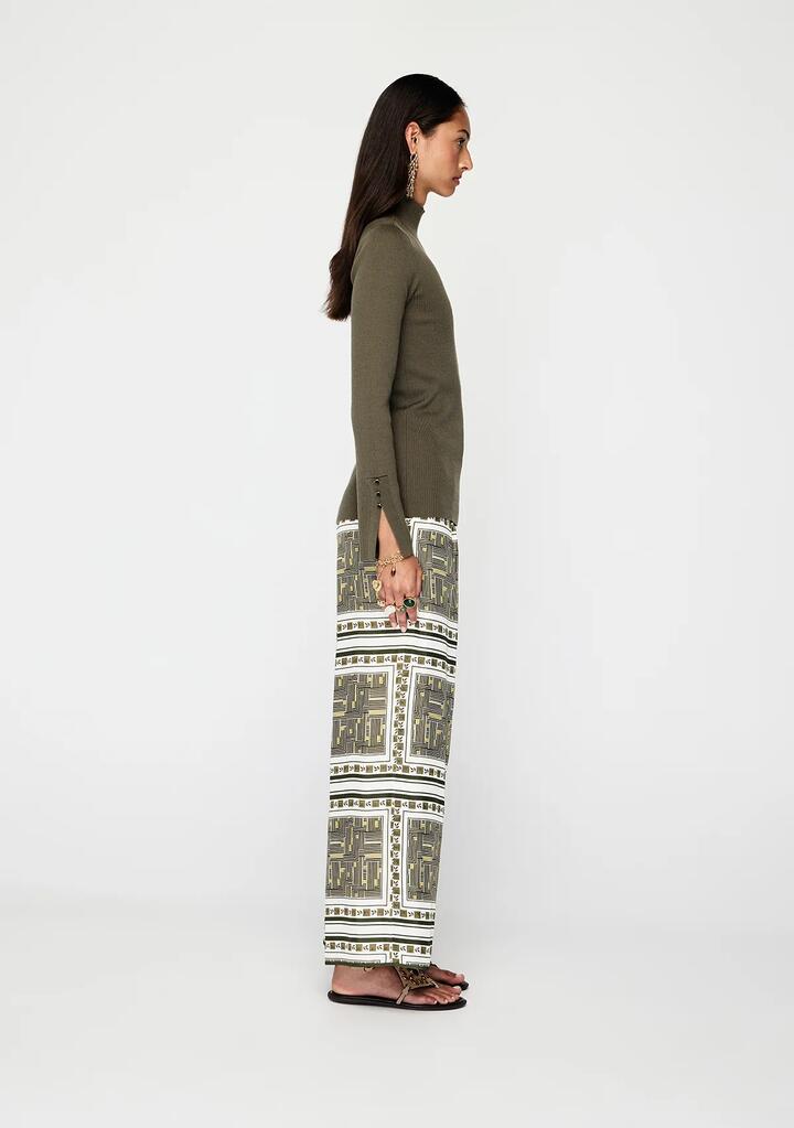 Image of a model wearing Tops. Productname: Vela Knit Top | MOS The Label in Sea Kelp colour by brand - MOS The Label