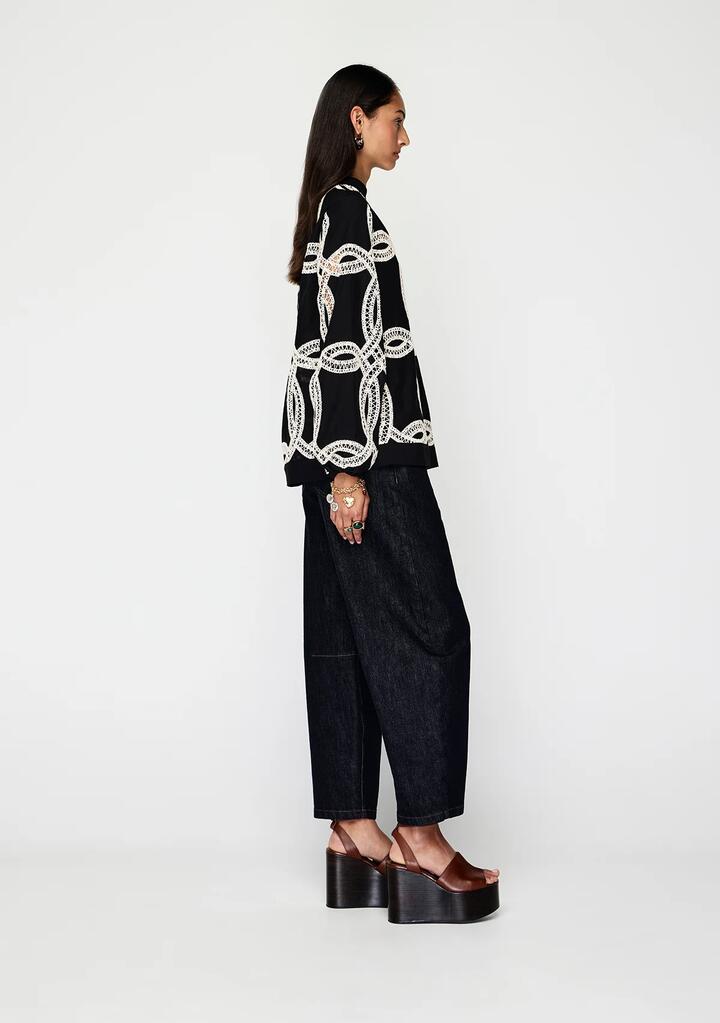 Image of a model wearing Tops. Productname: Livia Top | MOS The Label in Black colour by brand - MOS The Label