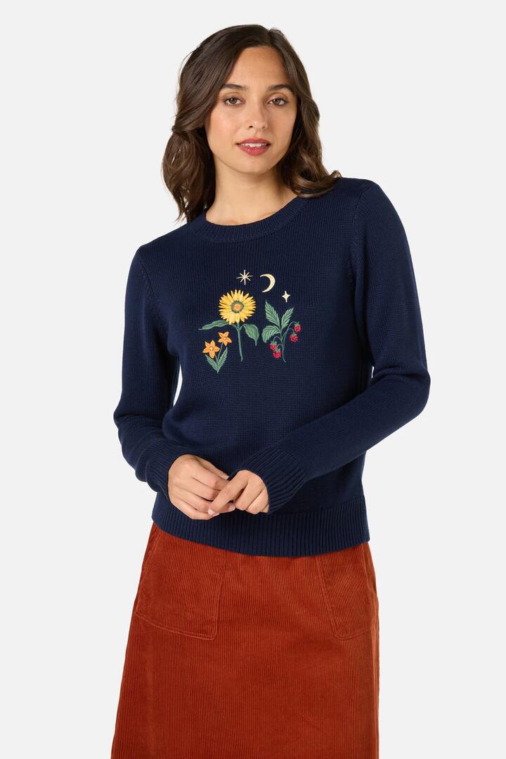 Image of a model wearing Outerwear. Productname: Midnight Garden Embroidered Jumper in Navy colour by brand - Princess Highway