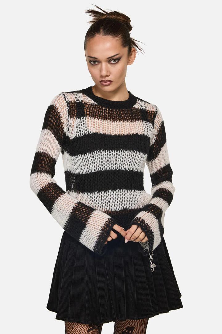 Image of a model wearing Tops. Productname: Beast Stripe Knit in Black/White colour by brand - Black Friday
