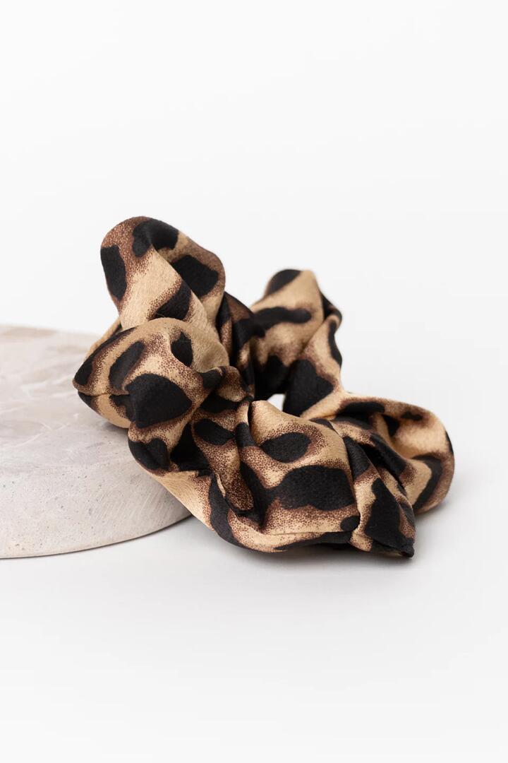 Image of Hair Accessories. Product name - Single Large Leopard Satin Scrunchie in colour by brand - Humble + Heart