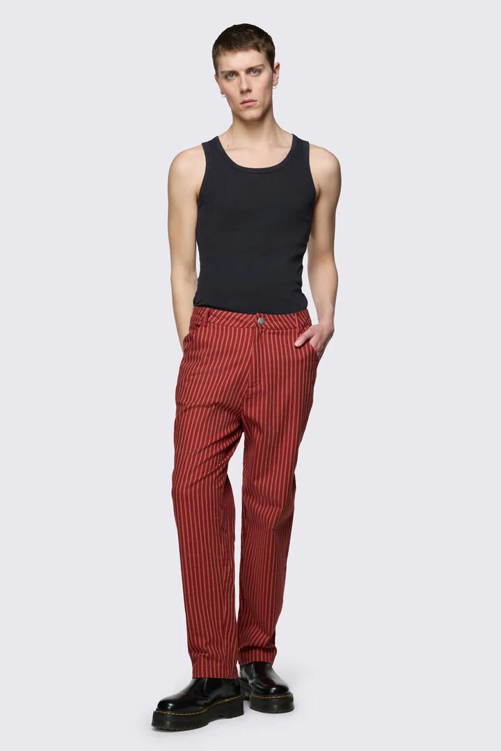 Image of a model wearing Pants. Productname: Faire Stripe Pant in Red/Gold colour by brand - Black Friday