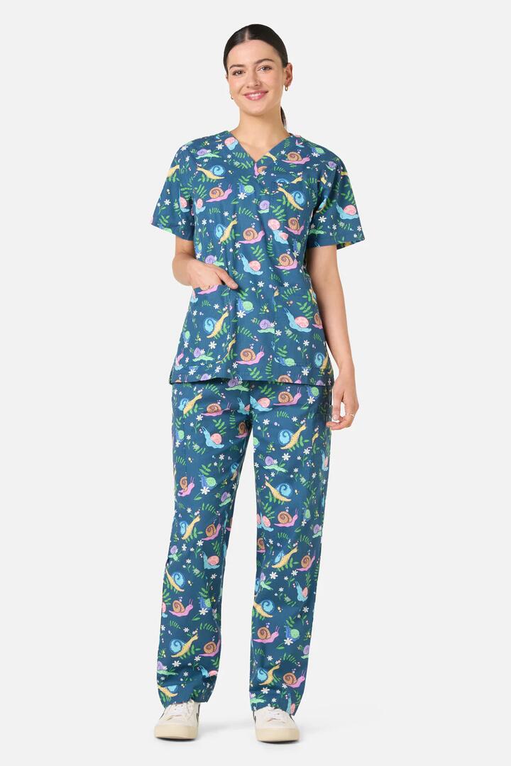 Image of a model wearing Uniforms & Workwear. Product name - Snailed It Scrub Set in Blue colour by brand - Scrubs With Love