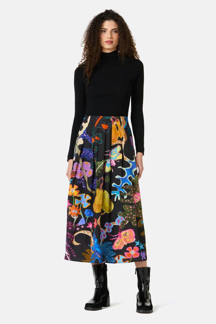 Image of a model wearing Skirts. Product name - Beetlemania Midi Skirt in Print colour by brand - Gorman