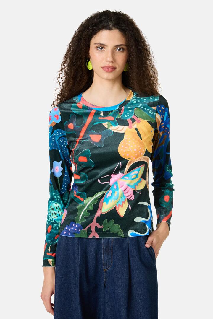 Image of a model wearing Tops. Product name - Beetlemania Velvet Long Sleeve Top in Print colour by brand - Gorman