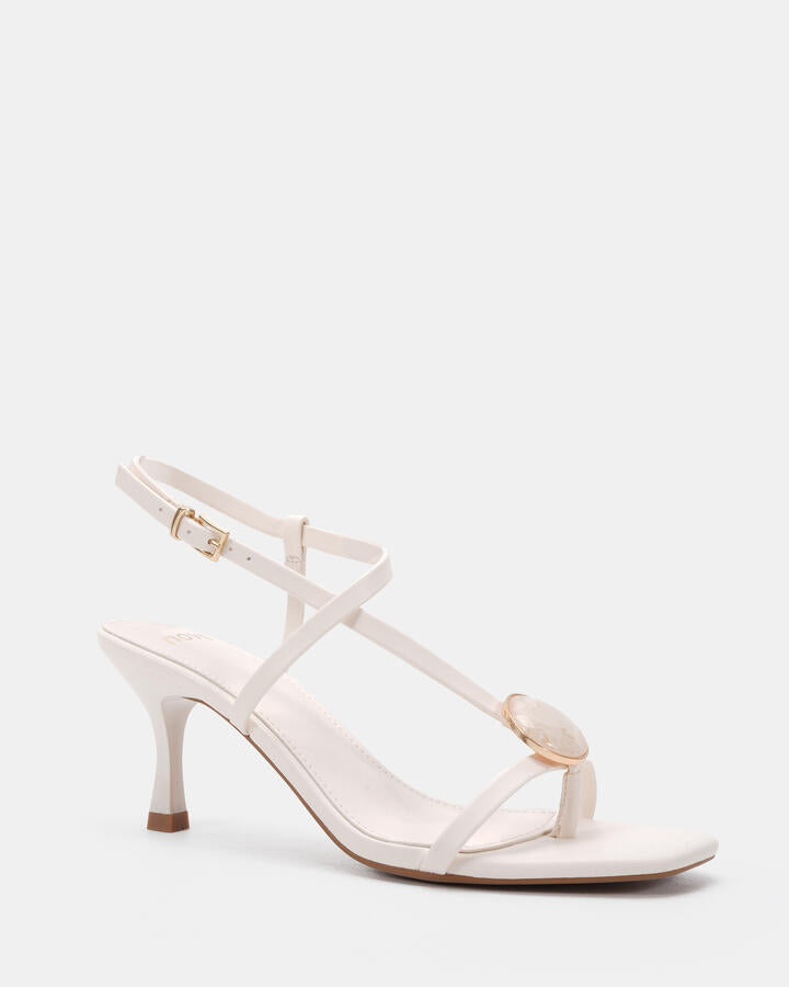 Image of Heels. Product name - Venti White Low Heels in Multi colour by brand - Novo