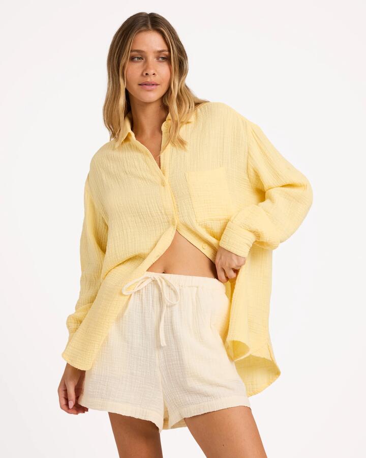 Image of a model wearing Tops. Product name - Billabong Womens Wanderer Long Sleeve Shirt Sunlight in Sunlight colour by brand - Billabong