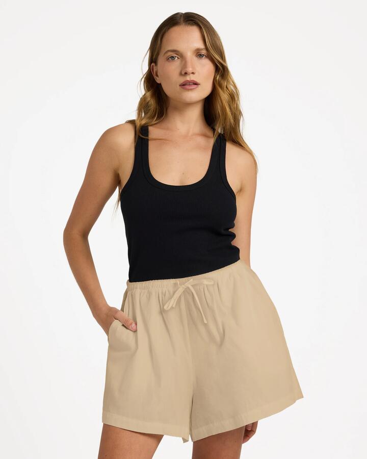 Image of a model wearing Shorts. Product name - Roxy Womens Lolani Linen Shorts Pebble in Pebble colour by brand - Roxy
